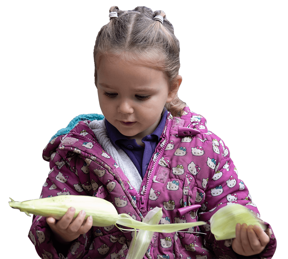 A child learning about her environments