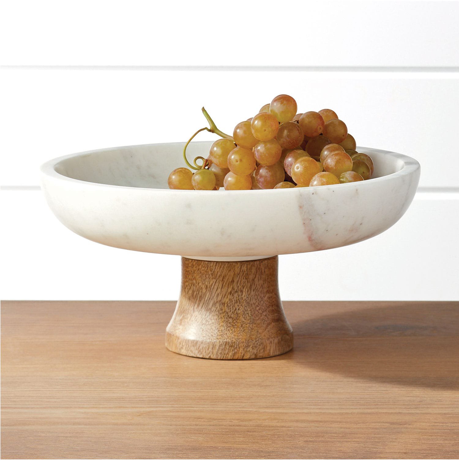 crate and barrel footed fruit bowl with wood and marble details zola wedding registry ideas